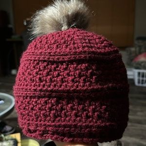 Wine colored beanie. Fits adult head never worn!